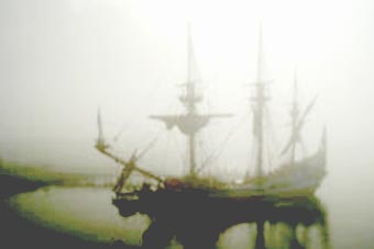 pirate ship shrouded in fog and mist